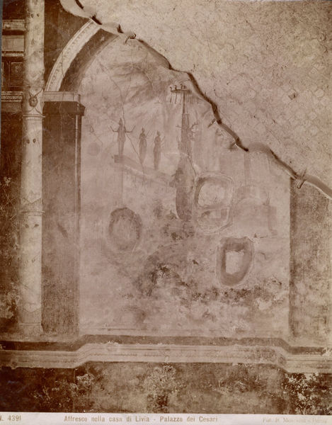 002796 - monumento - Casa di Livia, Triclinio o Sala dei Paesaggi (vano D), parete sud-ovest: particolare con raffigurazione del Santuario di Artemide (Diana), all'interno di un'edicola dipinta. Pittura in secondo stile pompeiano (fase finale- II B del Beyen). Bibliografia: Rizzo "Le pitture della casa di Livia" 1936

Senza negativo