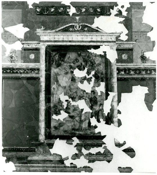 002051 - reperto - Casa di Augusto, "Studiolo di Augusto" c.d., cubicolo superiore, parete meridionale, particolare della decorazione del pannello centrale: pittura parietale in secondo stile pompeiano, dopo il distacco e restauro, con ricollocazione in situ su pannelli. Bibliografia: Musatti, G. "Casa di Augusto sul Palatino. L'intervento di restauro e considerazioni sulla decorazione pittorica" in Bollettino d'Arte 2, aprile-giugno 2009 (serie VII) pp. 21 e ss. / Iacopi, I. "Casa di Augusto, le pitture" Electa 2007

Neg. serie 6x6 nÂ° 18654 / Ripr. Film 2929