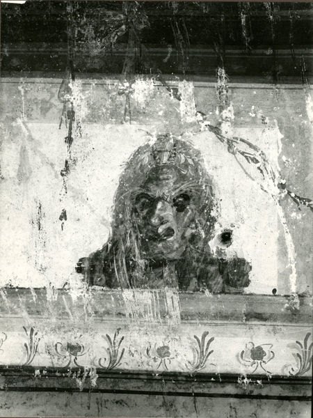 001873 - monumento - Casa di Augusto, "Stanza delle maschere" c.d.: pittura parietale in secondo stile pompeiano, in situ, prima degli interventi di restauro.
Bibliografia: Musatti, G. "Casa di Augusto sul Palatino. L'intervento di restauro e considerazioni sulla decorazione pittorica" in Bollettino d'Arte 2, aprile-giugno 2009 (serie VII) pp. 21 e ss. /  Iacopi, I. "La Casa di Augusto, le pitture" Electa 2007 

Neg. serie F nÂ° 2832