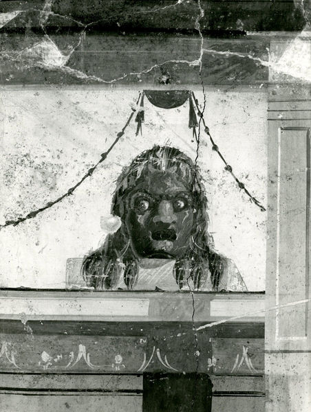 001868 - monumento - Casa di Augusto, "Stanza delle maschere" c.d.: pittura parietale in secondo stile pompeiano, in situ, successivamente gli interventi di restauro.
Bibliografia: Musatti, G. "Casa di Augusto sul Palatino. L'intervento di restauro e considerazioni sulla decorazione pittorica" in Bollettino d'Arte 2, aprile-giugno 2009 (serie VII) pp. 21 e ss. /  Iacopi, I. "La Casa di Augusto, le pitture" Electa 2007 

Neg. serie F nÂ°2828