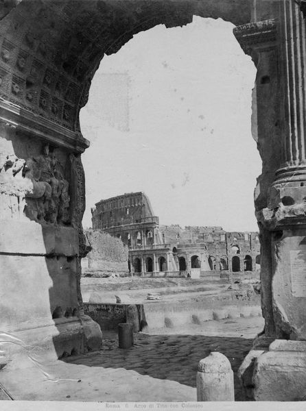020425 - monumento - Arco di Tito, veduta del Colosseo attraverso il fornice