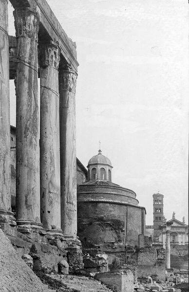 019849 - monumento - Tempio di Antonino e Faustina, veduta del angolo occidentale del colonnato, con il c.d. Tempio di Romolo, durante la seconda metÃ  del XIX secolo