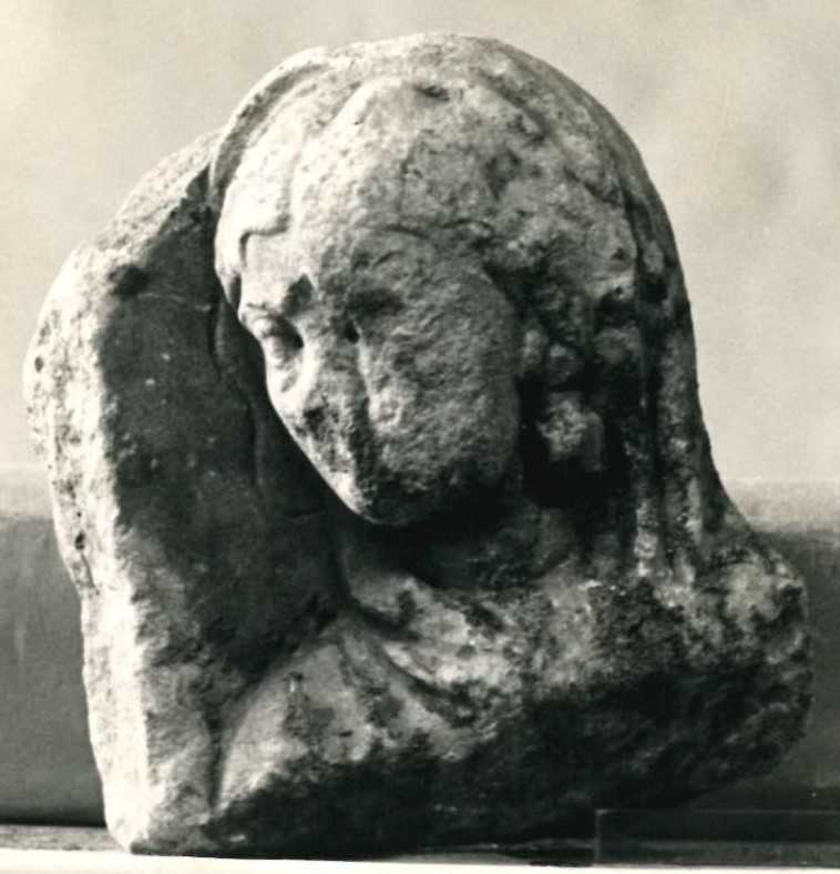 Frammento di rilievo figurato.