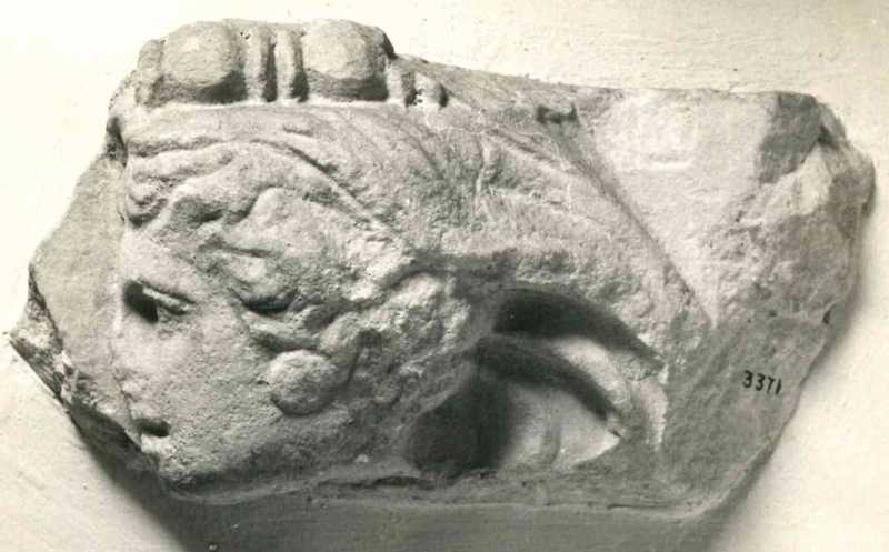 Frammento di rilievo figurato.